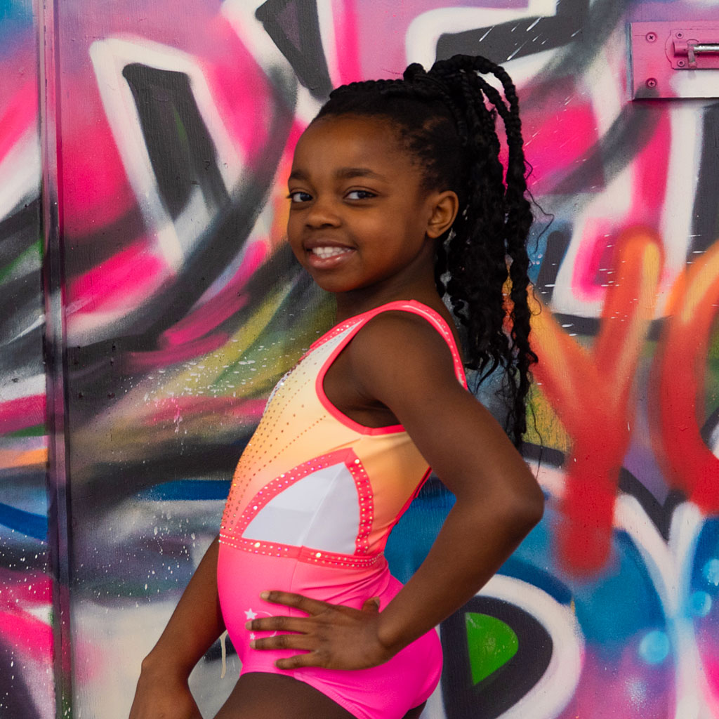 gymnasts wearing neon leotard photoshoot graffiti