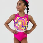 neon pink gymnastics sleeveless leotard with retro swirly pattern and secure open back ab crystal scatter